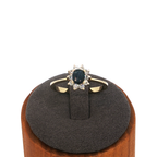 Deep Blue Sapphire Halo Ring in Yellow Gold