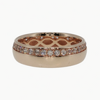 A rose gold eternity ring featuring a pavé diamond band and an openwork lattice pattern on the inner band, shown on a light gray reflective surface.