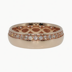 A rose gold eternity ring featuring a pavé diamond band and an openwork lattice pattern on the inner band, shown on a clean white background.