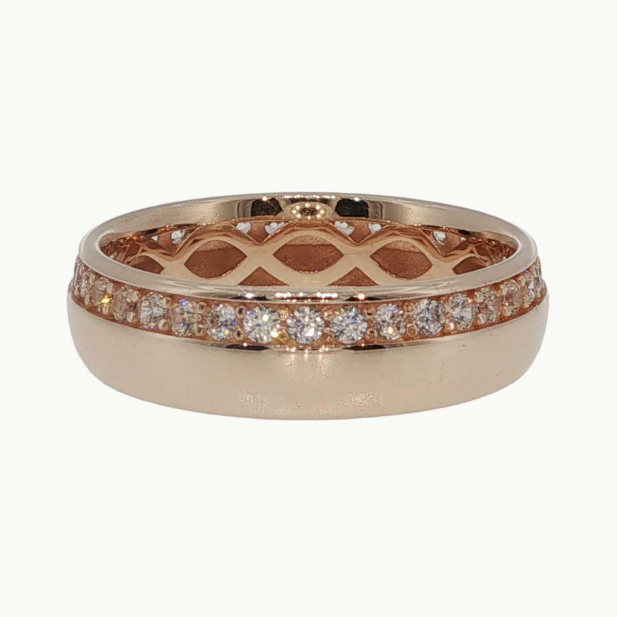 A rose gold eternity ring featuring a pavé diamond band and an openwork lattice pattern on the inner band, shown on a clean white background.