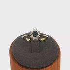 Deep Blue Sapphire Halo Ring in Yellow Gold